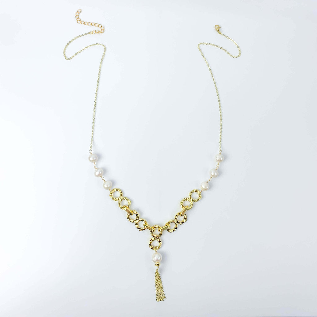 Empowering pearl and gold chain y necklace with tassel detail